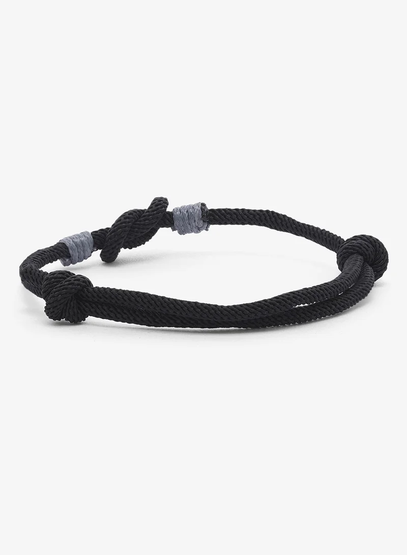 Seventy Five Cord Bracelet Featuring Central Knot Motif